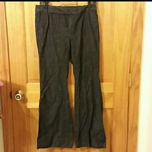 Gap flared dress pants a pattern on them that make them look like they're jeans